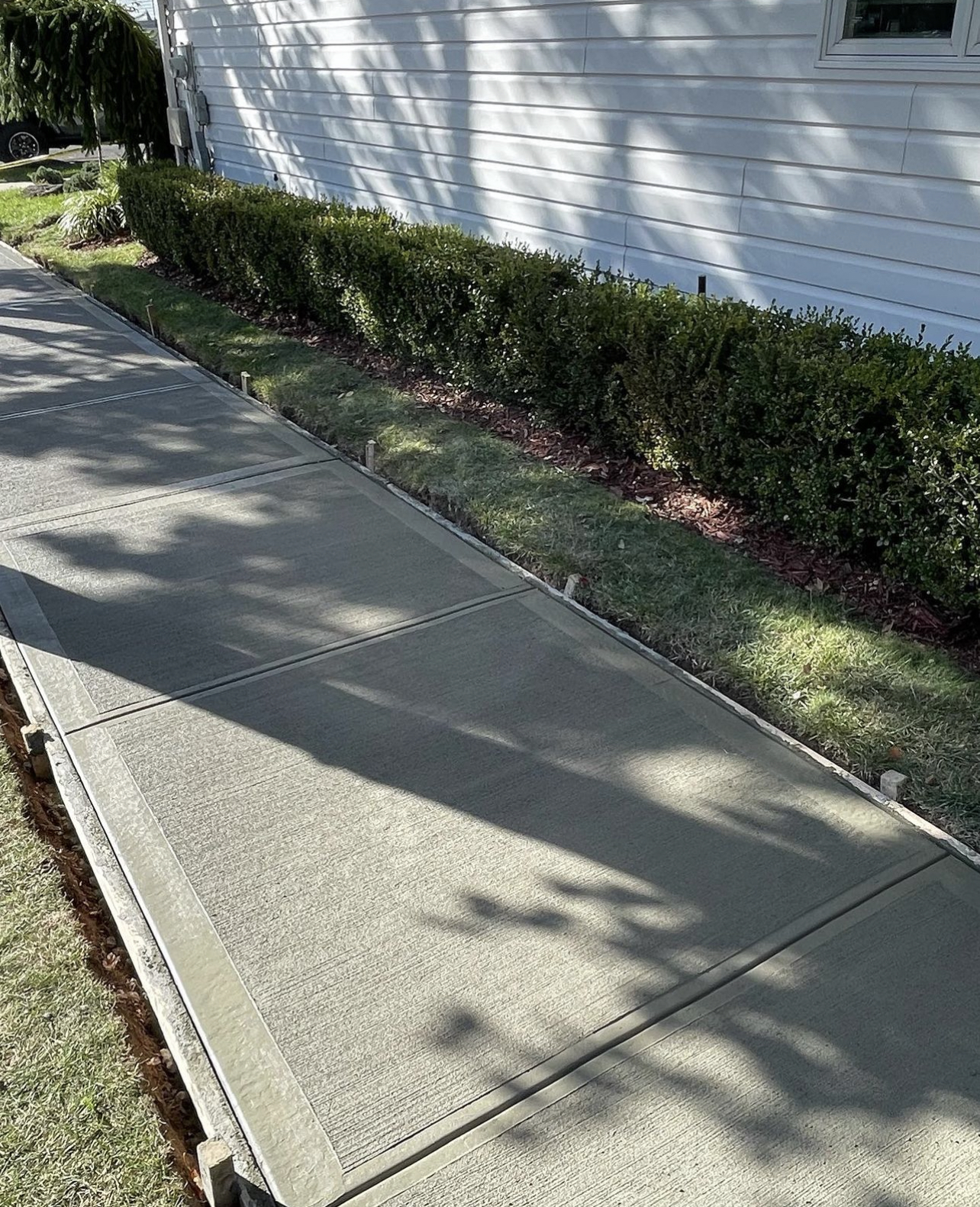 Concrete sidewalk. New concrete sidewalk.
                                    
