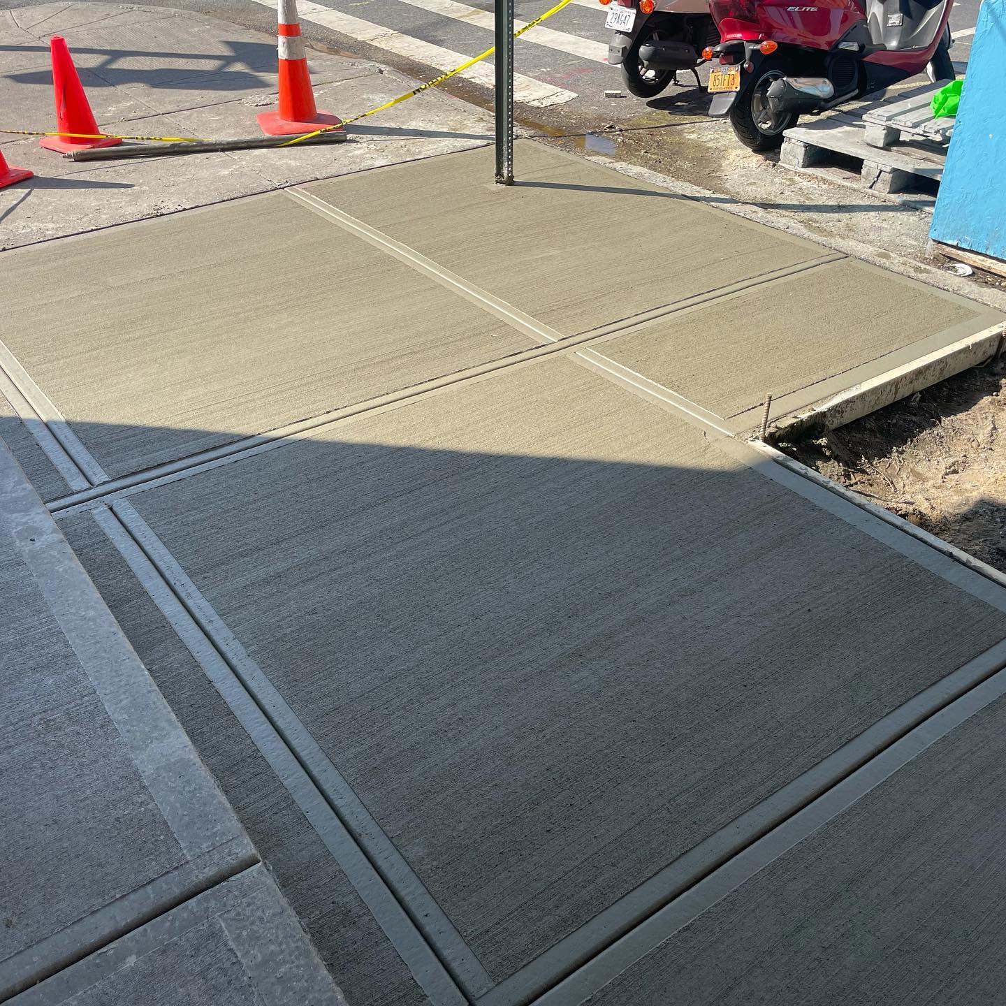 Breaking sidewalk in front of house