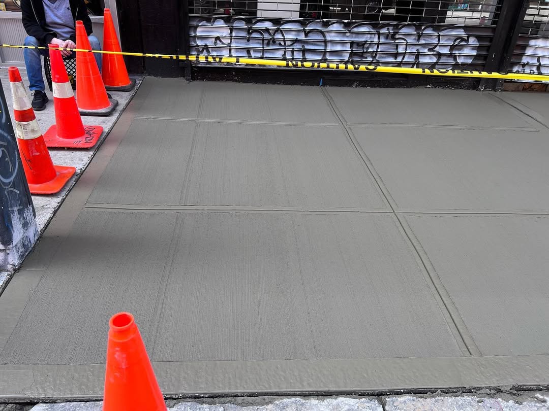 New Concrete sidewalk poured Queens